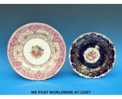 A Royal Worcester hand painted floral cabinet plate by Sedgley and a further Royal Worcester hand painted plate
