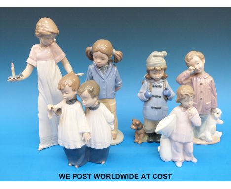 A quantity of Nao child figures