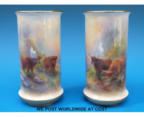 A pair of Royal Worcester cylindrical vases hand decorated with Highland cattle and signed 'Harry Stinton' signed (15cm tall)