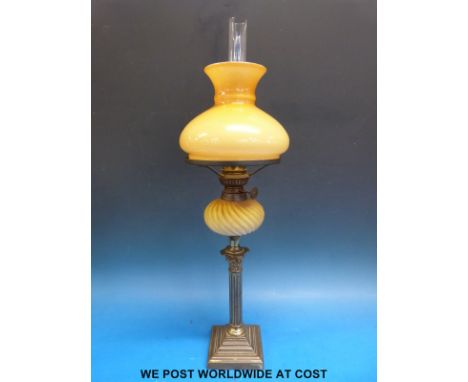 A Corinthian column oil lamp with wrythen glass reservoir (height 54cm)