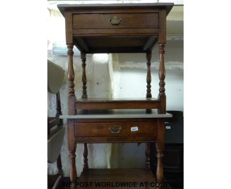 Two oak side tables with drawers and shelf below and a similar bedside unit