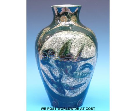 A large Lauder Barum vase decorated with stylised fish (30cm tall)