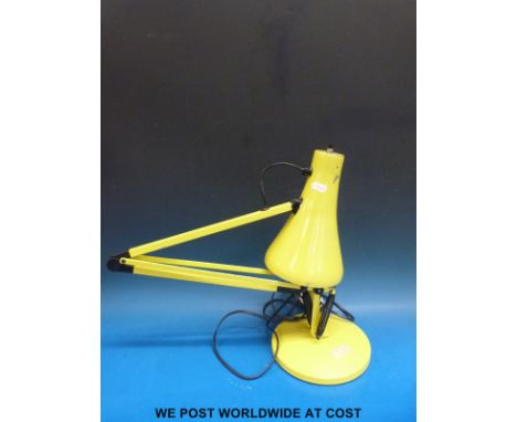 A yellow vintage Anglepoise lamp