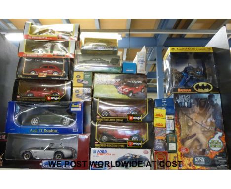 Twenty five Dinky, Corgi, Burago and other diecast model vehicles together with a Kenner Limited 100th Edition Batman figure 