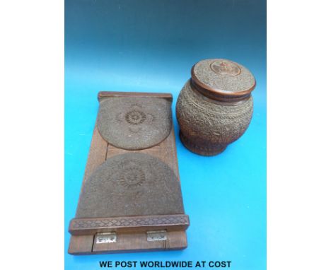 A carved Indian tobacco jar/tea caddy and a carved wooden book slide