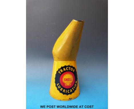 A vintage Shell Tractor Lubrication oil jug