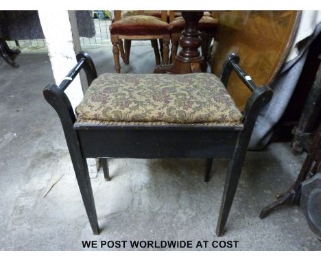 An ebonised piano stool containing a collection of music, includes wartime 1940s examples, picture fronts etc