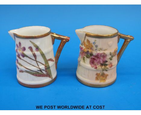 Two c1900 Royal Worcester barrel shaped jugs hand painted with flowers (6cm tall)