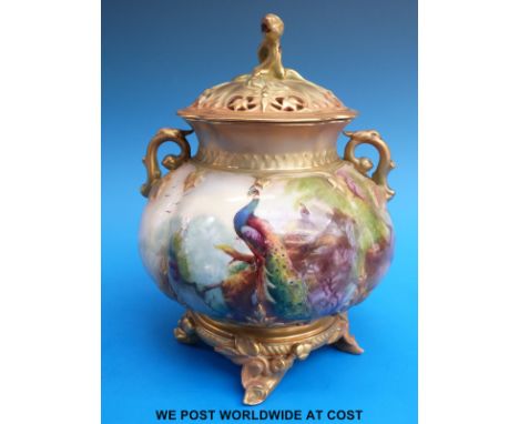 A Royal Worcester pot pourri hand decorated with peacocks in a pine tree signed R. Austin, green printed Worcester mark, shap