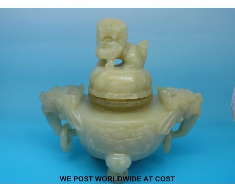 Chinese carved jade or hardstone censer decorated with Foo Dog finial and twin dragon mask handles raised on lion mask feet (