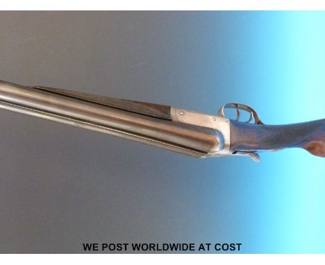 Unnamed 12 bore double barrelled side by side shotgun with chequered grip and forend and double trigger, serial number 4473/3