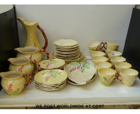 Carltonware tea set decorated with foxgloves on yellow ground with bamboo effect handles