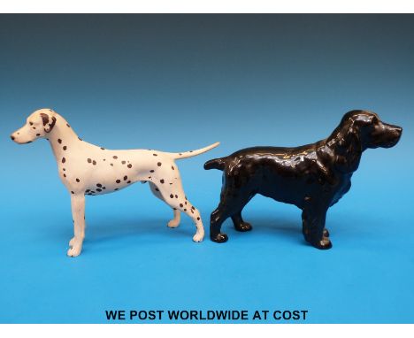 A Beswick spaniel and a ceramic dalmation