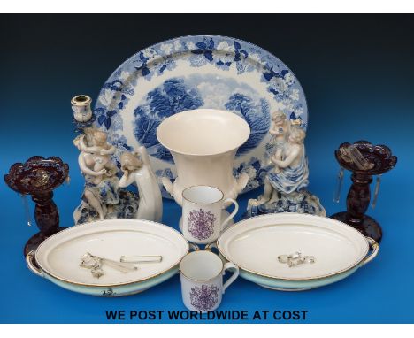 A German figural candlestick, Enoch Wood Village Scenes meat plate, Victorian drop lustres, two Royal Worcester armorial ture
