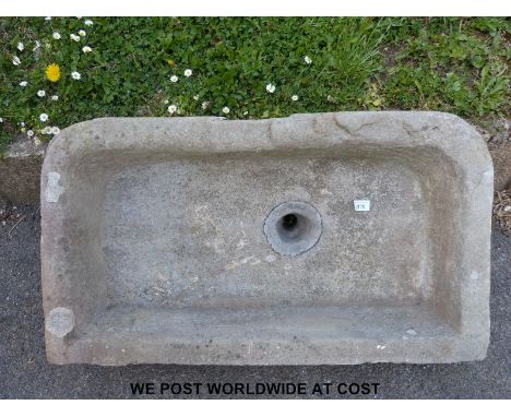 A natural stone trough or sink with lead waste pipe (83 x 47 x 16cm) 