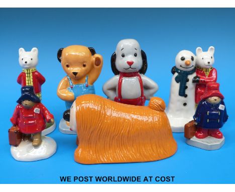 A collection of Wade Storybook figures including Paddington, Rupert, Sooty & Sweep, Dougal from Magic Roundabout etc