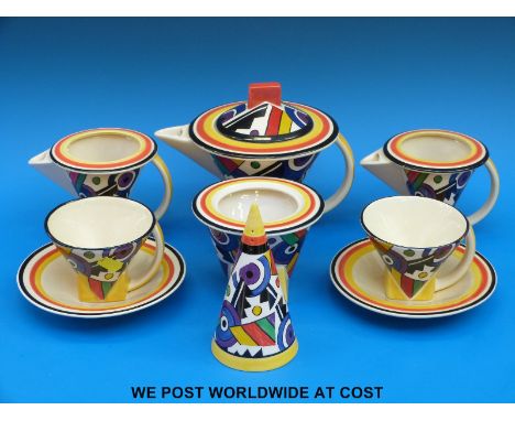 A collection of Art Deco Clarice Cliff style 'Lightning' designs by Chelsea Works includes teapot, two milk jugs, two cups an