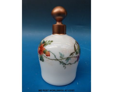 Two South Staffordshire opaque white milk glass scent bottles both with floral enamel decoration and gilt banding (both appro