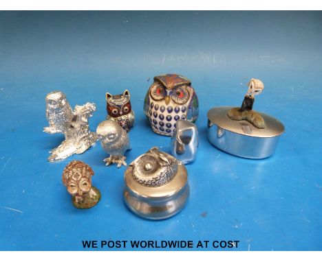 A cloisonné owl together with a collection of pewter owls and small trinket boxes