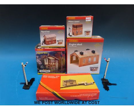 Five Hornby 00 gauge buildings comprising Engine Shed R8004; Signal Box R8534; Water Tower R8003; Signal Box R 8005 and Signa