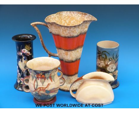 A collection of Art Deco pottery including a Wade jug, Crown Devon and Bretby vases etc