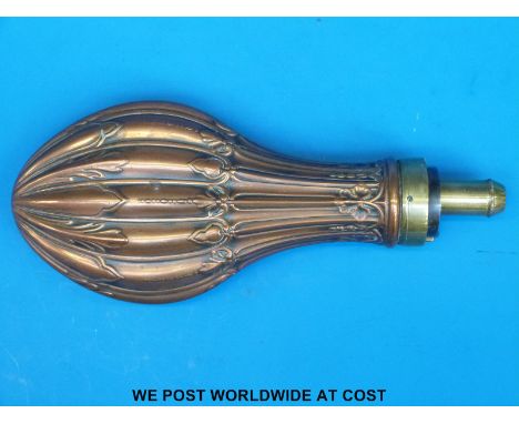 A Dixon & Sons copper embossed powder flask (length 21cm)