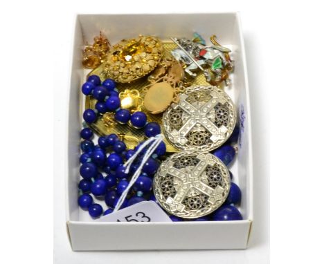 A lapis lazuli necklace, a pair of citrine earrings, an enamelled George and the dragon brooch, a compact and costume jewelle