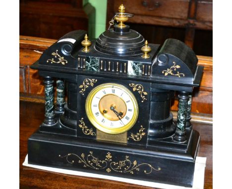 A black slate and marble striking mantel clock 