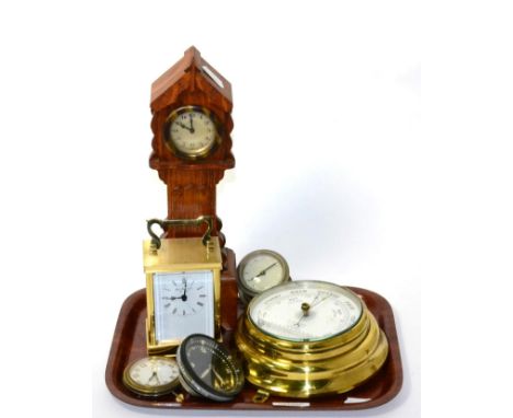 A miniature oak cased longcase clock, a brass carriage timepiece, barometer, and three other clock/watch movements