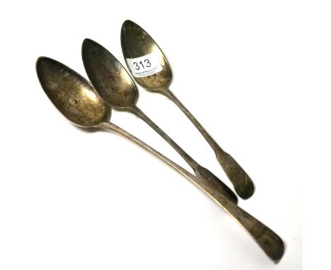 A Georgian silver spoon and a pair of silver serving spoons (3) 7.7 ozt