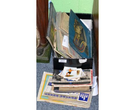 A miscellaneous collection of cigarette card albums, various types and markers and a collection of football and cricket relat