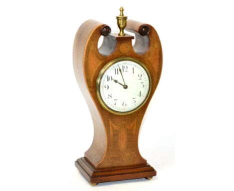 An Edwardian inlaid mahogany mantel timepiece 