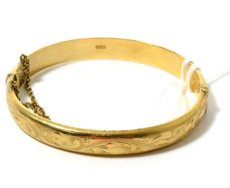 A 9ct gold bangle 11.1 grams 