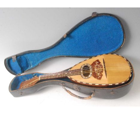 A mid-20th century Italian mandolin, having a rosewood back with tortoiseshell and mother of pearl plate, bearing a label for