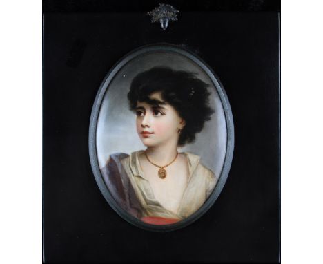 Rectangular framed, early 20th Century, oval painted porcelain plaque, bust length portrait of a young girl with dark hair, w