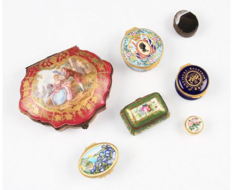A group of seven assorted porcelain and enamel boxes to include four Halcyon Days examples including Elizabeth II Golden Jubi