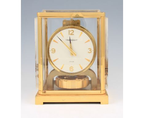 A Jaeger LeCoultre Atmos clock, the case having lucite Japanese themed design side panels with white lucite top panel with cl