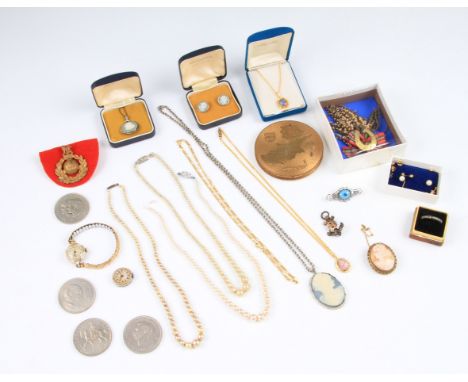 A lot of costume jewellery to include two cameo pendants, a cameo brooch, a gold-fronted silver anchor brooch, a marcasite se