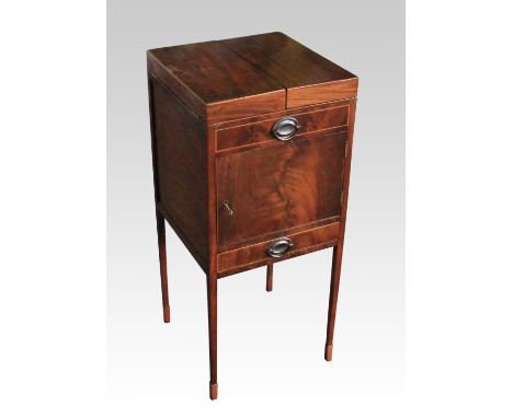 A Georgian mahogany wash stand with fitted interior and ceramic bowl with over one door and one drawers on square slender sup