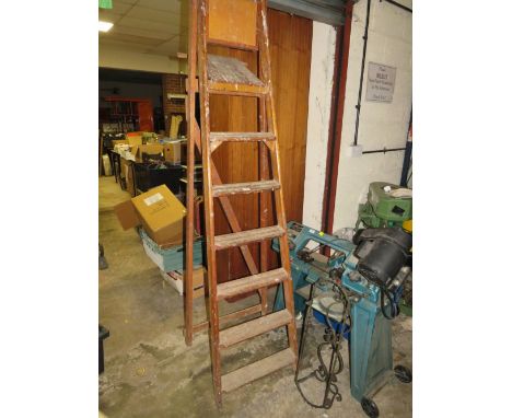 A SET OF VINTAGE&nbsp;WOODEN STEP LADDERS
