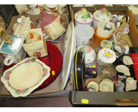 TWO TRAYS OF ASSORTED CERAMICS TO INCLUDE A SADLER 'THE TENNIS MATCH' NOVELTY TEAPOT, OTHER NOVELTY TEAPOTS, SMALL ROYAL DOUL