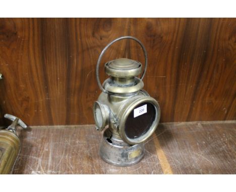 A VINTAGE BRASS LUCAS KING ROAD LAMP 