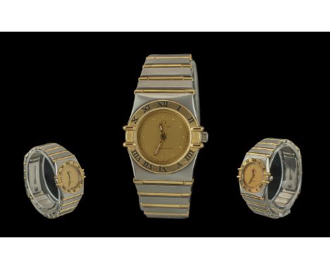 Omega Constellation Ladies 18ct Gold and Steel Quartz Wrist Watch, features 18ct gold bezel and links, champagne dial and fiv