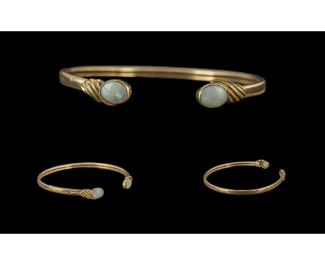 Ladies 9ct Gold Pleasing Opal Set Cuff Bangle, The Opals of Pleasing Colour, Marked 9.375. The Opals of Pleasing Colours, Wei