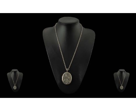 A Fine Vintage Large Sterling Silver Hinged Locket with Engraved Decoration to Front Cover, With Attached Sterling Silver Bel
