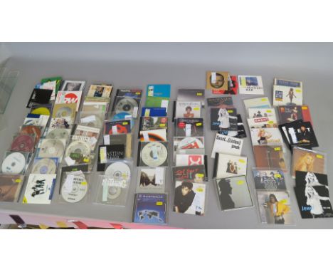 Closed record shop CDs including Warner music promo CDs, Island studios, Virgin, Columbia, etc plus Traffic, Paul Young, UB40
