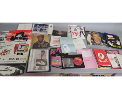 Music and film lot including signed Kylie Minogue CD signed Carry on Doctor DVD, Boy George signature and doodle, signed thea