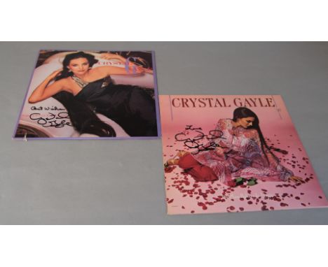 Crystal Gayle two signed LPs "We Must Believe in Magic" signed "Love Crystal Gayle" in black pen, plus "Nobody wants to be al