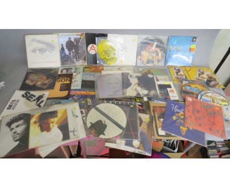 Vinyl records 12 inch singles and picture discs from a closed&nbsp;record shop includes Madonna Erotica with poster, Bedtime 