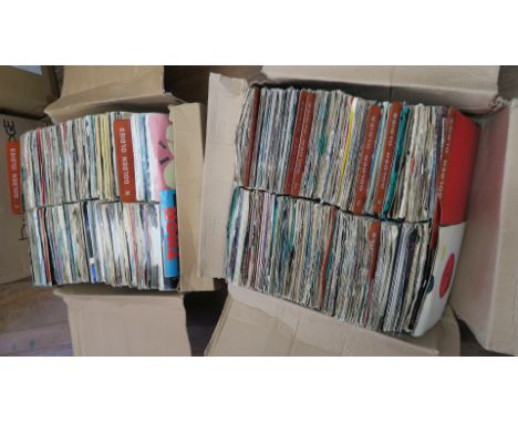 Ex record shop stock of pre-loved 7 inch vinyl singles in alphabetical order with golden oldies tabs including Ian Dury, Dura